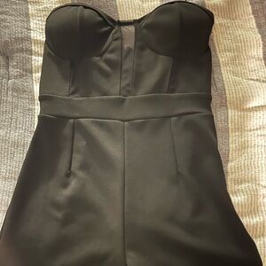 Brand new Charlotte Russe black romper with mesh cut out